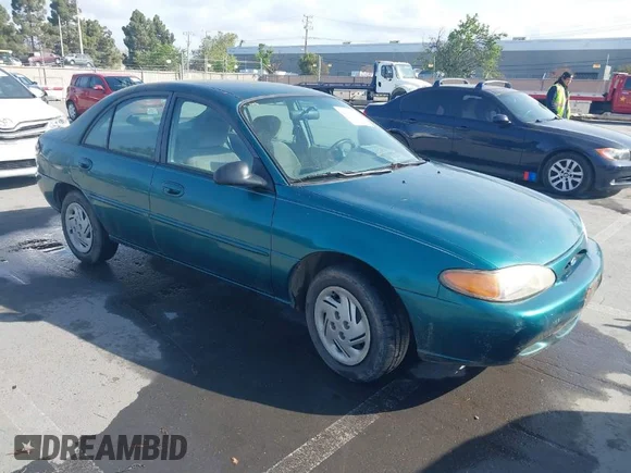 ✅ 1997 Ford Escort LX • VIN: 1FALP13P3VW125396 • Лот: 42036066. Опубліковано раніше на IAAI з пробігом 132 239 миль. Безкоштовний доступ до архіву аукціонних продажів зі США та докладний звіт про історію автомобіля на DreamBid. Зображення 1.