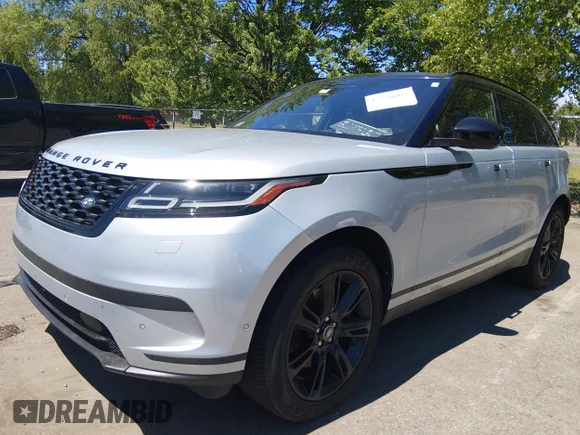 ✅ 2021 Land Rover Range Rover Velar S • VIN: SALYJ2EX6MA322765 • Лот: 45320002. Опубликован ранее на IAAI с пробегом 69 718 миль. Бесплатный доступ к архиву аукционных продаж из США и подробный отчёт об истории автомобиля на DreamBid. Изображение 2.