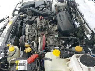 ✅ 1998 Subaru Legacy Outback • VIN: 4S3BG6854W7605789 • Lot: 41264648. Listed on IAAI with 115,799 mi. Free auction sales archive from the USA and detailed vehicle history report at DreamBid. Image 18.