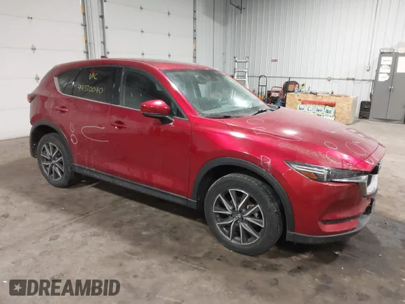 ✅ 2017 Mazda CX-5 Grand Touring • VIN: JM3KFBDLXH0176273 • Lot: 44370040. Wystawiony na IAAI z przebiegiem 87 086 mil. Bezpłatny archiwum sprzedaży aukcyjnych z USA i szczegółowy raport historii pojazdu na DreamBid. Zdjęcie 1.