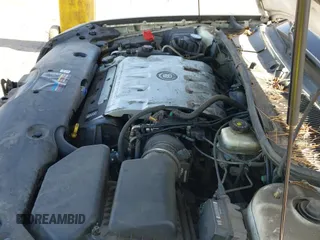 ✅ 2001 Cadillac DeVille • VIN: 1G6KD54Y91U138546 • Лот: 42383163. Опубликован ранее на IAAI с пробегом 138 263 миль. Бесплатный доступ к архиву аукционных продаж из США и подробный отчёт об истории автомобиля на DreamBid. Изображение 13.