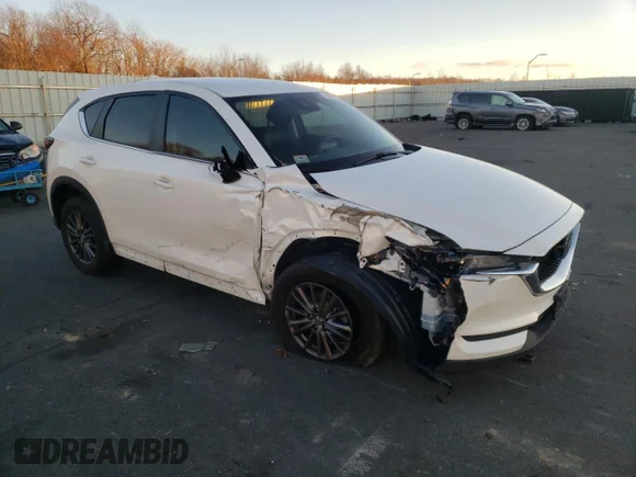 ✅ 2020 Mazda CX-5 Touring • VIN: JM3KFBCM6L0731951 • Лот: 68407752. Опубліковано раніше на Copart з пробігом 88 523 миль. Безкоштовний доступ до архіву аукціонних продажів зі США та докладний звіт про історію автомобіля на DreamBid. Зображення 4.