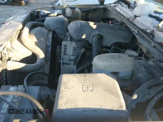 2004 GMC Sierra 1500 SLT with VIN 1GTEK19T14E214460, listed as a IAAI auction lot 41247573 with 213,859 mi miles and . Bid and sale history available at DreamBid. Image 12.