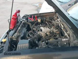 ✅ 2003 Nissan Frontier XE • VIN: 1N6ED27T73C468328 • Lot: 43738087. Listed on IAAI with 153,565 mi. Free auction sales archive from the USA and detailed vehicle history report at DreamBid. Image 12.