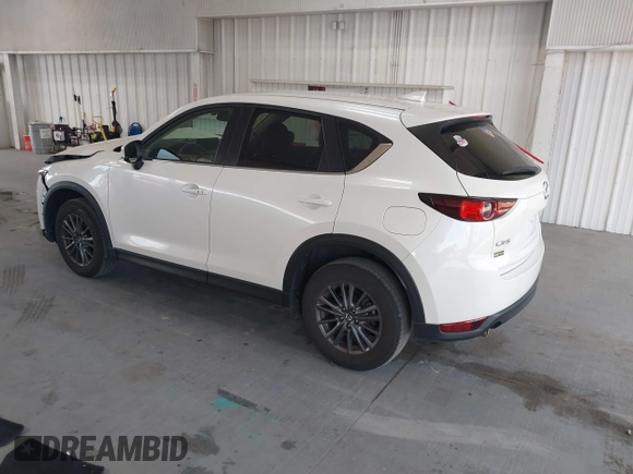 ✅ 2021 Mazda CX-5 Touring • VIN: JM3KFACM2M0317285 • Лот: 45166809. Опубликован ранее на IAAI с пробегом 54 536 миль. Бесплатный доступ к архиву аукционных продаж из США и подробный отчёт об истории автомобиля на DreamBid. Изображение 3.