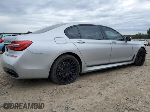 ✅ 2017 BMW 7 Series 750i • VIN: WBA7F0C32HGM21558 • Lot: 82760385. Wystawiony na Copart z przebiegiem 103 798 mil. Bezpłatny archiwum sprzedaży aukcyjnych z USA i szczegółowy raport historii pojazdu na DreamBid. Zdjęcie 3.