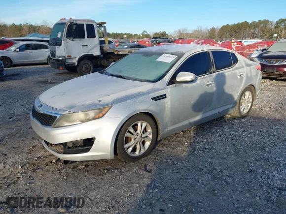✅ 2013 Kia Optima LX • VIN: 5XXGM4A71DG129357 • Lot: 44189833. Listed on IAAI with 275,422 mi. Free auction sales archive from the USA and detailed vehicle history report at DreamBid. Image 2.
