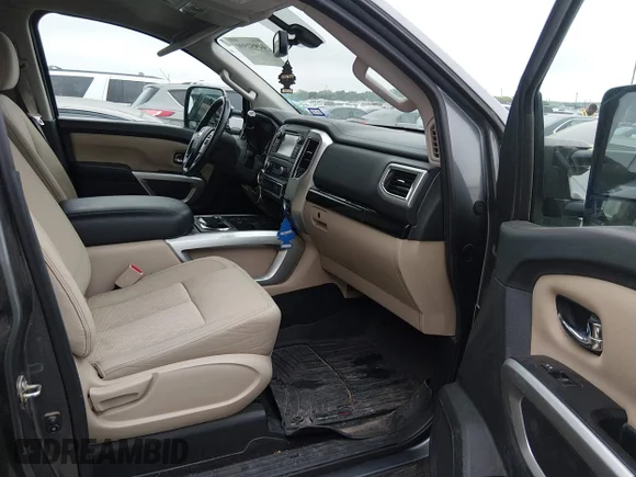 ✅ 2016 Nissan Titan Platinum Reserve • VIN: 1N6BA1F49GN515000 • Lot: 44952590. Wystawiony na IAAI z przebiegiem 165 835 mil. Bezpłatny archiwum sprzedaży aukcyjnych z USA i szczegółowy raport historii pojazdu na DreamBid. Zdjęcie 5.
