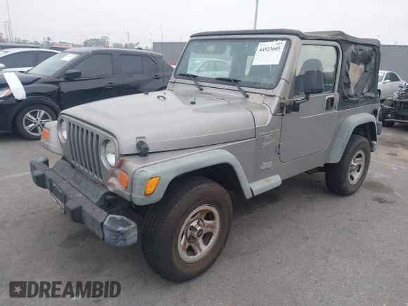 ✅ 2001 Jeep Wrangler Sport • VIN: 1J4FA49S61P308392 • Lot: 44523605. Wystawiony na IAAI z przebiegiem 191 401 mil. Bezpłatny archiwum sprzedaży aukcyjnych z USA i szczegółowy raport historii pojazdu na DreamBid. Zdjęcie 2.