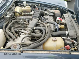 ✅ 1986 Alfa Romeo Spider Veloce • VIN: ZARBA541XG1037637 • Lot: 42929553. Wystawiony na IAAI z przebiegiem 124 876 mil. Bezpłatny archiwum sprzedaży aukcyjnych z USA i szczegółowy raport historii pojazdu na DreamBid. Zdjęcie 13.