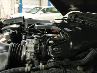 ✅ 2018 Jeep Wrangler Unlimited Sport S • VIN: 1C4HJXDG2JW156233 • Лот: 43163135. Опубликован ранее на IAAI с пробегом 125 668 миль. Бесплатный доступ к архиву аукционных продаж из США и подробный отчёт об истории автомобиля на DreamBid. Изображение 19.