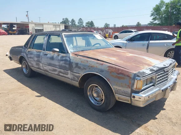 ✅ 1985 Chevrolet Caprice Classic Brougham • VIN: 1G1BN69Z6FY185317 • Lot: 42032298. Listed on IAAI with 4,311 mi. Free auction sales archive from the USA and detailed vehicle history report at DreamBid. Image 1.