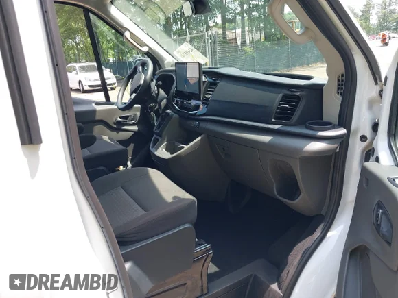 ✅ 2023 Ford Transit Passenger XL • VIN: 1FBAX2C82PKA53394 • Лот: 42493748. Опубліковано раніше на IAAI з пробігом 69 352 миль. Безкоштовний доступ до архіву аукціонних продажів зі США та докладний звіт про історію автомобіля на DreamBid. Зображення 5.