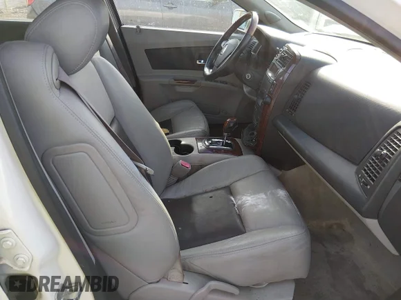 ✅ 2006 Cadillac CTS • VIN: 1G6DP577060210137 • Lot: 44775237. Listed on IAAI with 136,692 mi. Free auction sales archive from the USA and detailed vehicle history report at DreamBid. Image 5.