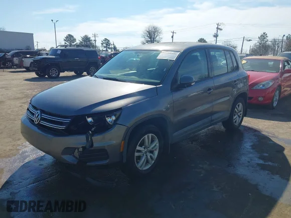 ✅ 2014 Volkswagen Tiguan S • VIN: WVGBV3AX1EW550847 • Лот: 44321320. Опубліковано раніше на IAAI з пробігом 96 416 миль. Безкоштовний доступ до архіву аукціонних продажів зі США та докладний звіт про історію автомобіля на DreamBid. Зображення 2.