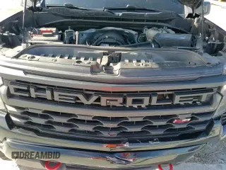 ✅ 2022 Chevrolet Silverado 1500 Custom Trail Boss • VIN: 3GCPDCED9NG670133 • Lot: 87021705. Wystawiony na Copart z przebiegiem 86 891 mil. Bezpłatny archiwum sprzedaży aukcyjnych z USA i szczegółowy raport historii pojazdu na DreamBid. Zdjęcie 15.