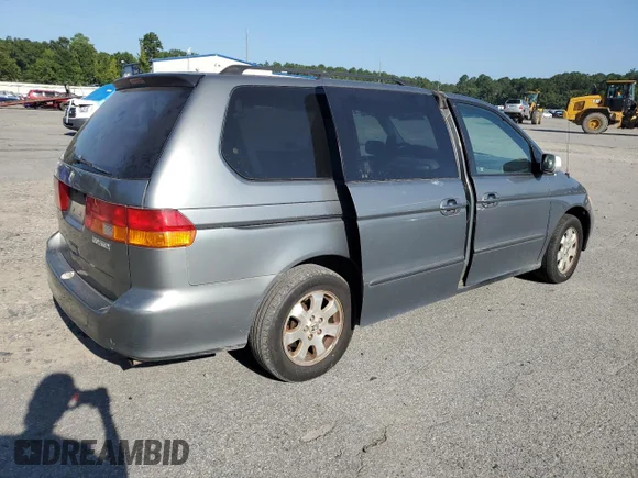 ✅ 2002 Honda Odyssey EX-L • VIN: 5FNRL180X2B038414 • Лот: 85259595. Опубліковано раніше на Copart з пробігом 276 460 миль. Безкоштовний доступ до архіву аукціонних продажів зі США та докладний звіт про історію автомобіля на DreamBid. Зображення 5.