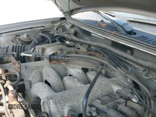 ✅ 2004 Ford Mustang Deluxe • VIN: 1FAFP44604F201689 • Lot: 42943708. Listed on IAAI with 144,523 mi. Free auction sales archive from the USA and detailed vehicle history report at DreamBid. Image 12.