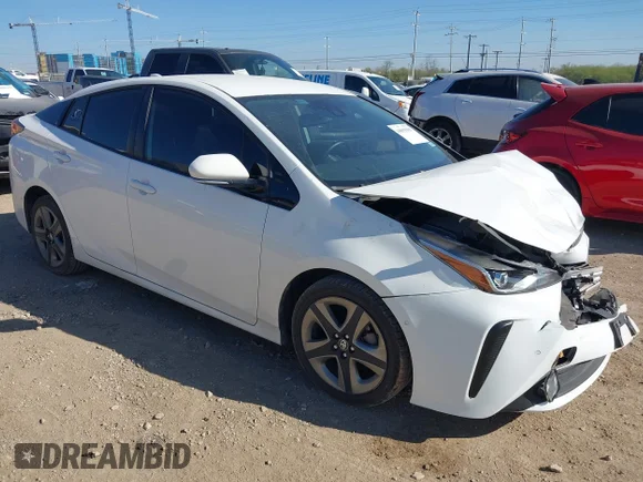 ✅ 2020 Toyota Prius L Eco • VIN: JTDKARFU8L3110737 • Lot: 44093919. Listed on IAAI with 82,356 mi. Free auction sales archive from the USA and detailed vehicle history report at DreamBid. Image 1.