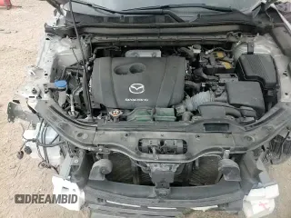 ✅ 2024 Mazda CX-5 S Select • VIN: JM3KFBBL4R0502055 • Лот: 92219335. Опубликован ранее на Copart с пробегом 80 080 миль. Бесплатный доступ к архиву аукционных продаж из США и подробный отчёт об истории автомобиля на DreamBid. Изображение 14.