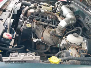 ✅ 2000 Jeep Cherokee SE • VIN: 1J4FF27S0YL192844 • Lot: 43727528. Wystawiony na IAAI z przebiegiem 255 170 mil. Bezpłatny archiwum sprzedaży aukcyjnych z USA i szczegółowy raport historii pojazdu na DreamBid. Zdjęcie 13.