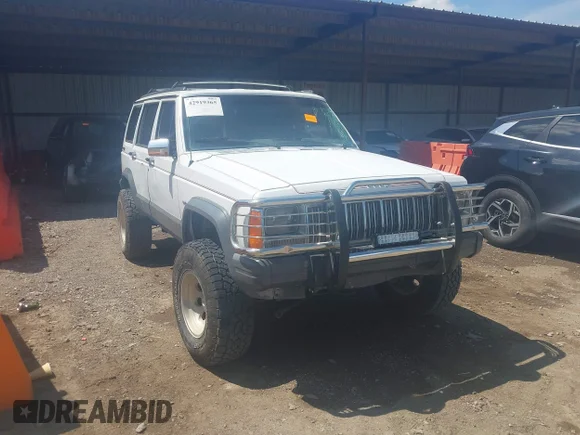 ✅ 1991 Jeep Cherokee • VIN: 1J4FJ58SXML527469 • Лот: 42919365. Опубліковано раніше на IAAI з пробігом 2 486 179 миль. Безкоштовний доступ до архіву аукціонних продажів зі США та докладний звіт про історію автомобіля на DreamBid. Зображення 1.