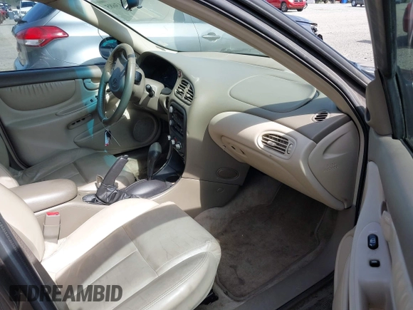 ✅ 2001 Oldsmobile Alero GLS • VIN: 1G3NF52E91C188480 • Лот: 43143685. Опубликован ранее на IAAI с пробегом 182 482 миль. Бесплатный доступ к архиву аукционных продаж из США и подробный отчёт об истории автомобиля на DreamBid. Изображение 5.