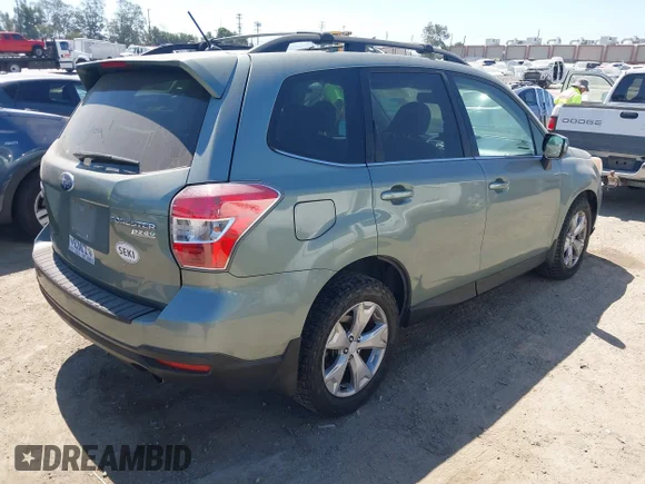 ✅ 2014 Subaru Forester Limited • VIN: JF2SJAHC4EH538706 • Lot: 45640833. Listed on IAAI with 138,207 mi. Free auction sales archive from the USA and detailed vehicle history report at DreamBid. Image 4.