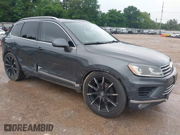 ✅ 2015 Volkswagen Touareg Lux • VIN: WVGEF9BP8FD005558 • Lot: 45371450. Wystawiony na IAAI z przebiegiem 156 189 mil. Bezpłatny archiwum sprzedaży aukcyjnych z USA i szczegółowy raport historii pojazdu na DreamBid. Zdjęcie 1.