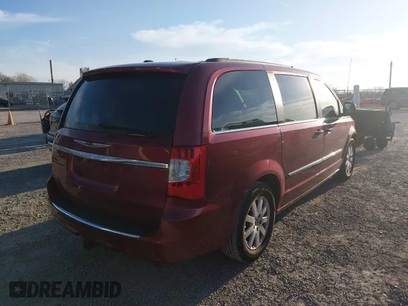 ✅ 2013 Chrysler Town & Country Touring • VIN: 2C4RC1BG0DR818189 • Lot: 44819172. Listed on IAAI with 207,264 mi. Free auction sales archive from the USA and detailed vehicle history report at DreamBid. Image 4.