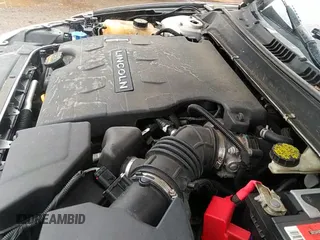 ✅ 2013 Lincoln MKZ • VIN: 3LN6L2JKXDR811822 • Lot: 42009690. Listed on IAAI with 128,405 mi. Free auction sales archive from the USA and detailed vehicle history report at DreamBid. Image 13.