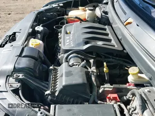 2015 Dodge Journey American Value z VIN 3C4PDCAB1FT637818, wystawiony jako IAAI lot #43497822 z przebiegiem 164 458 mil mil oraz . Historia ofert i sprzedaży dostępna na DreamBid. Obrazek 12.