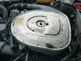 ✅ 1989 Mercedes-Benz 420 SEL • VIN: WDBCA35E5KA460704 • Лот: 42496215. Опубликован ранее на IAAI с пробегом 169 703 миль. Бесплатный доступ к архиву аукционных продаж из США и подробный отчёт об истории автомобиля на DreamBid. Изображение 14.