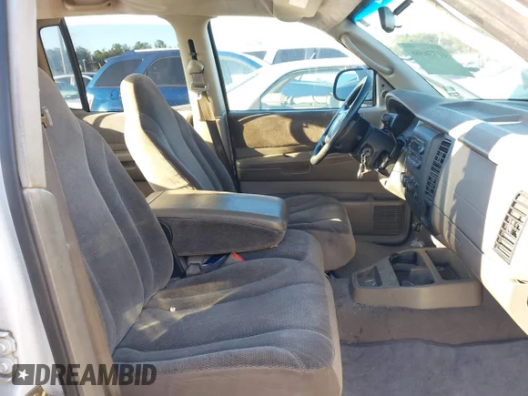 ✅ 2002 Dodge Dakota SLT • VIN: 1B7HL48N72S586317 • Lot: 41736566. Wystawiony na IAAI z przebiegiem Nie podano. Bezpłatny archiwum sprzedaży aukcyjnych z USA i szczegółowy raport historii pojazdu na DreamBid. Zdjęcie 5.
