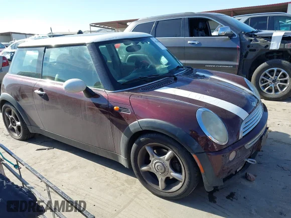 ✅ 2003 MINI Hardtop • VIN: WMWRC33413TE15233 • Лот: 44265040. Опубликован ранее на IAAI с пробегом 154 473 миль. Бесплатный доступ к архиву аукционных продаж из США и подробный отчёт об истории автомобиля на DreamBid. Изображение 1.