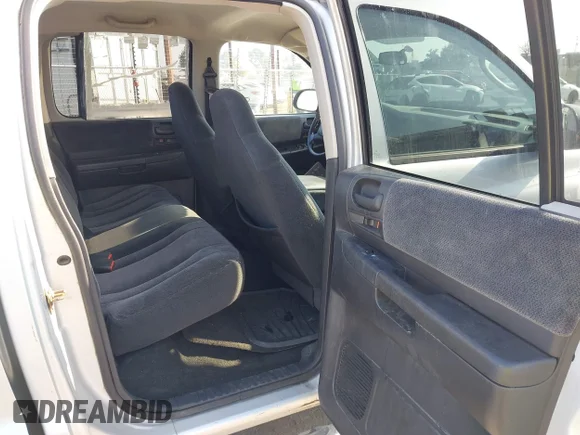 ✅ 2004 Dodge Dakota Sport • VIN: 1D7HG38K44S732251 • Lot: 43536264. Wystawiony na IAAI z przebiegiem 139 413 mil. Bezpłatny archiwum sprzedaży aukcyjnych z USA i szczegółowy raport historii pojazdu na DreamBid. Zdjęcie 8.
