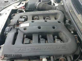 ✅ 2004 Chrysler 300M M • VIN: 2C3AE76K04H659371 • Lot: 42373862. Listed on IAAI with 230,145 mi. Free auction sales archive from the USA and detailed vehicle history report at DreamBid. Image 12.