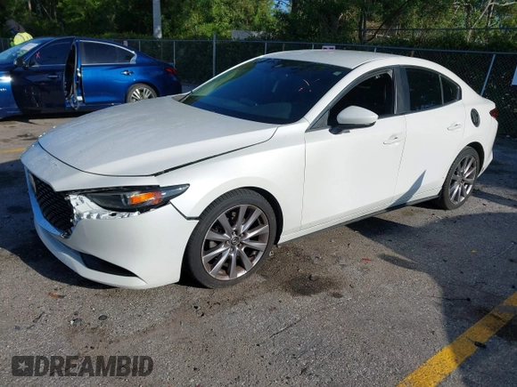 ✅ 2019 Mazda 3 Select • VIN: 3MZBPAAL0KM107050 • Лот: 45155041. Опубліковано раніше на IAAI з пробігом 99 513 миль. Безкоштовний доступ до архіву аукціонних продажів зі США та докладний звіт про історію автомобіля на DreamBid. Зображення 2.