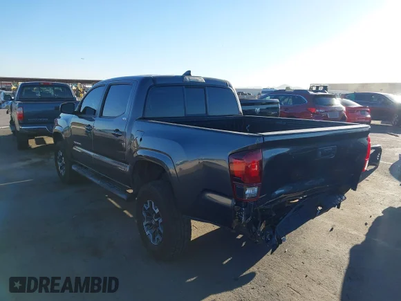 ✅ 2018 Toyota Tacoma SR • VIN: 5TFAX5GN3JX108913 • Lot: 45489864. Listed on IAAI with 92,302 mi. Free auction sales archive from the USA and detailed vehicle history report at DreamBid. Image 3.