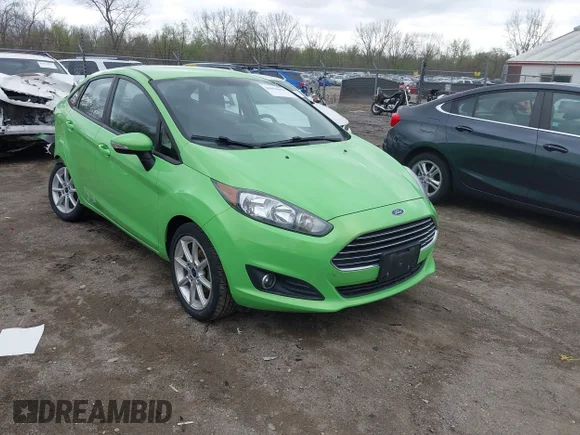 ✅ 2014 Ford Fiesta SE • VIN: 3FADP4BJ7EM228548 • Lot: 44858869. Wystawiony na IAAI z przebiegiem 125 403 mil. Bezpłatny archiwum sprzedaży aukcyjnych z USA i szczegółowy raport historii pojazdu na DreamBid. Zdjęcie 1.