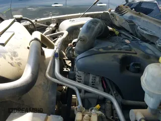 2013 Ram 1500 Express z VIN 3C6JR6AT7DG508514, wystawiony jako IAAI lot #42220733 z przebiegiem 204 145 mil mil oraz . Historia ofert i sprzedaży dostępna na DreamBid. Obrazek 12.