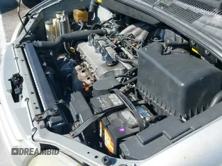 ✅ 2002 Toyota Sienna CE • VIN: 4T3ZF19C72U470601 • Lot: 42620671. Listed on IAAI with 228,834 mi. Free auction sales archive from the USA and detailed vehicle history report at DreamBid. Image 12.