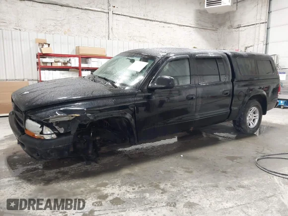 ✅ 2003 Dodge Dakota • VIN: 1D7HG38Z83S345567 • Лот: 43145498. Опубліковано раніше на IAAI з пробігом 155 828 миль. Безкоштовний доступ до архіву аукціонних продажів зі США та докладний звіт про історію автомобіля на DreamBid. Зображення 2.