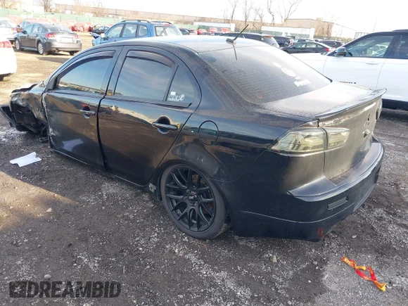 ✅ 2014 Mitsubishi Lancer Ralliart • VIN: JA32V6FVXEU014440 • Lot: 44096268. Wystawiony na IAAI z przebiegiem 129 011 mil. Bezpłatny archiwum sprzedaży aukcyjnych z USA i szczegółowy raport historii pojazdu na DreamBid. Zdjęcie 3.