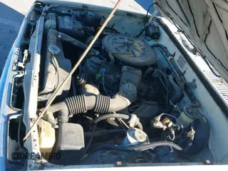 ✅ 1985 Toyota Pickup Deluxe • VIN: JT4RN56D3F0130668 • Lot: 43530597. Wystawiony na IAAI z przebiegiem 104 289 mil. Bezpłatny archiwum sprzedaży aukcyjnych z USA i szczegółowy raport historii pojazdu na DreamBid. Zdjęcie 14.