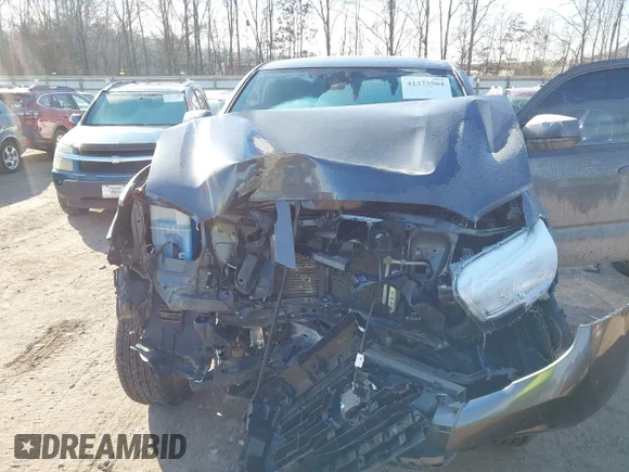 ✅ 2023 Toyota Tacoma SR • VIN: 3TMCZ5AN4PM582962 • Lot: 41373504. Wystawiony na IAAI z przebiegiem 34 138 mil. Bezpłatny archiwum sprzedaży aukcyjnych z USA i szczegółowy raport historii pojazdu na DreamBid. Zdjęcie 6.