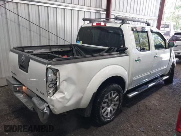 ✅ 2012 Nissan Frontier SV • VIN: 1N6AD0EV8CC400305 • Lot: 42048834. Listed on IAAI with 104,720 mi. Free auction sales archive from the USA and detailed vehicle history report at DreamBid. Image 4.