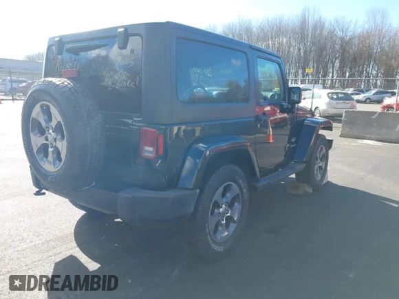 ✅ 2016 Jeep Wrangler Sahara • VIN: 1C4GJWBG7GL128592 • Лот: 43696021. Опубликован ранее на IAAI с пробегом 136 593 миль. Бесплатный доступ к архиву аукционных продаж из США и подробный отчёт об истории автомобиля на DreamBid. Изображение 4.