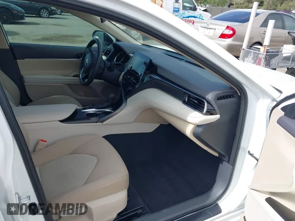 ✅ 2022 Toyota Camry Hybrid LE • VIN: 4T1C31AK5NU570713 • Lot: 45202013. Wystawiony na IAAI z przebiegiem 64 360 mil. Bezpłatny archiwum sprzedaży aukcyjnych z USA i szczegółowy raport historii pojazdu na DreamBid. Zdjęcie 5.