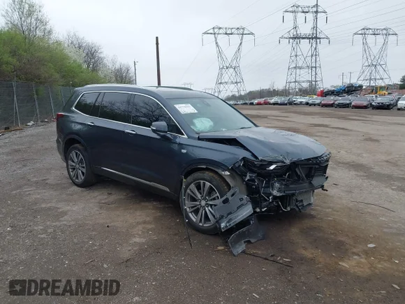 ✅ 2021 Cadillac XT6 Premium Luxury • VIN: 1GYKPDRS7MZ214057 • Lot: 44770361. Listed on IAAI with 59,325 mi. Free auction sales archive from the USA and detailed vehicle history report at DreamBid. Image 1.